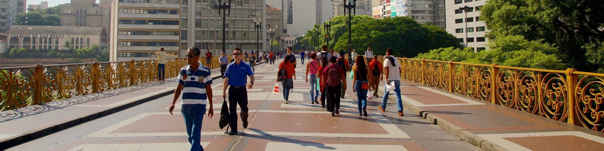 Viaduto do Cha which includes a city as well as a large group of people