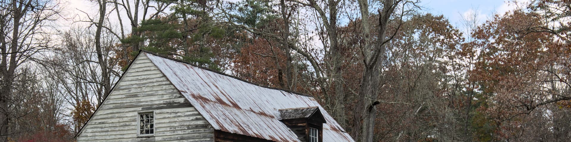 abandoned old historic grain mill along a stream in upstate new york (o and w rail trail)