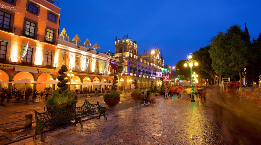 Zócalo de Puebla which includes night scenes