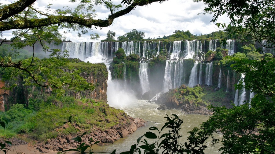 Iguazu Falls which includes a waterfall and landscape views