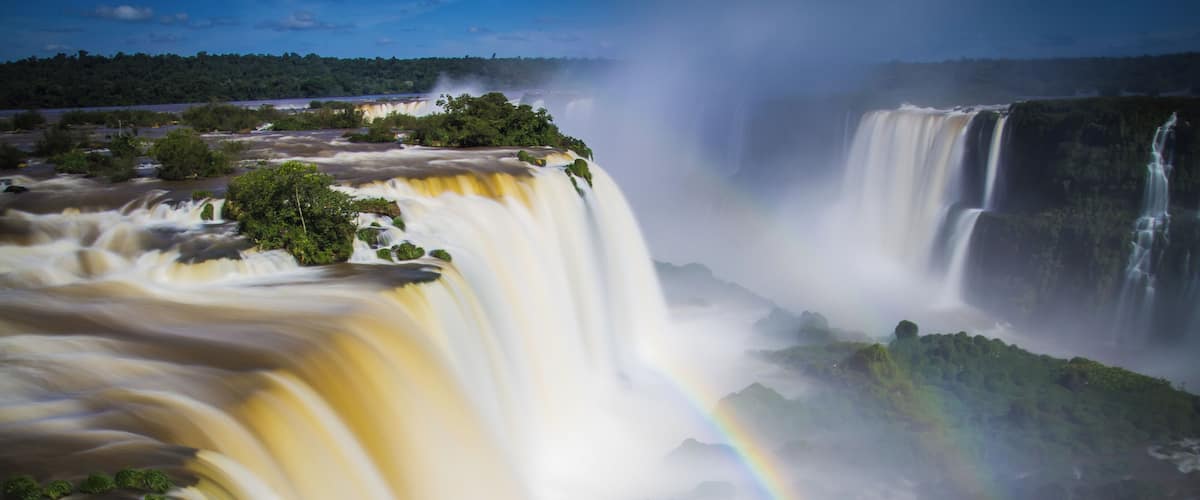 Iguazu falls shared by Argentina and Brazil.
The constant sound of it is probably even more impressive than what you see.
As water (of the falls) is flying in the air, it is a good spot for rainbow lovers (or double rainbow here).
Tip : take some changes, you are going to need it when you'll leave the place, with all your clothes wet!
#LifeAtExpedia #rainbow