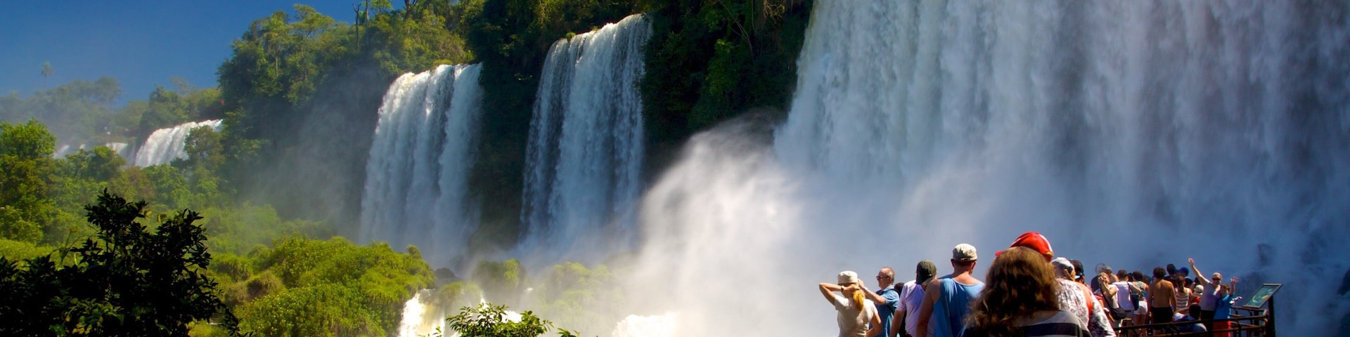 Iguacu Falls which includes a waterfall as well as a large group of people