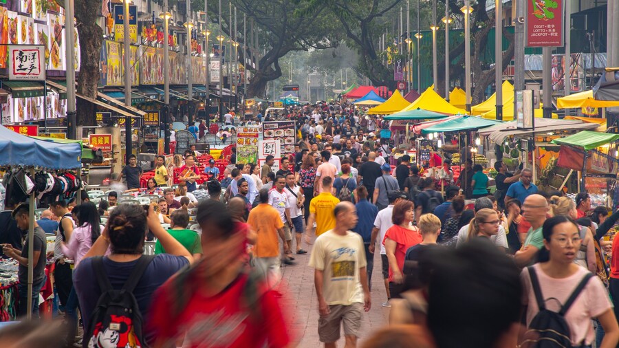 Jalan Alor showing markets and street scenes as well as a large group of people