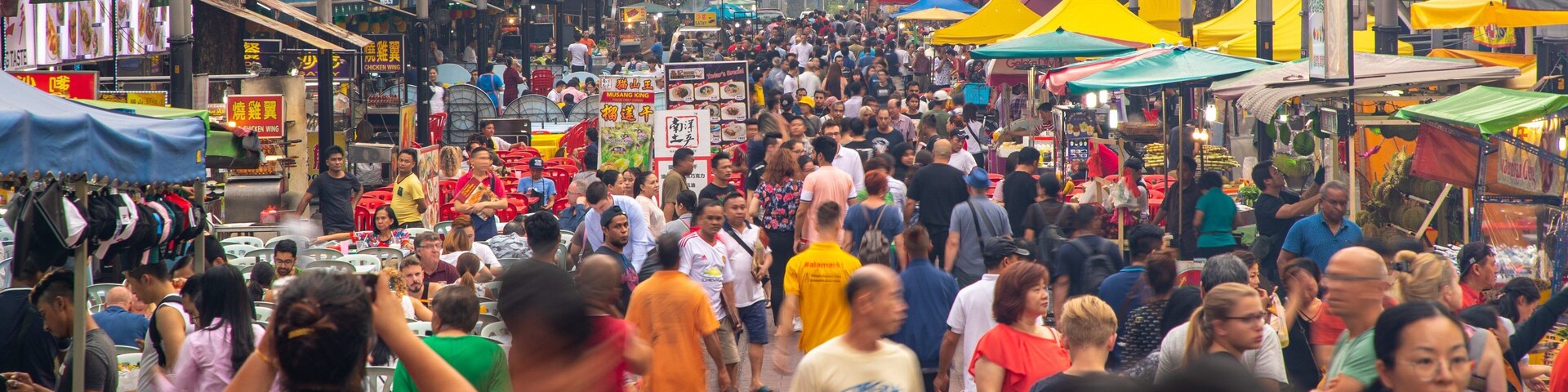 Jalan Alor showing markets and street scenes as well as a large group of people