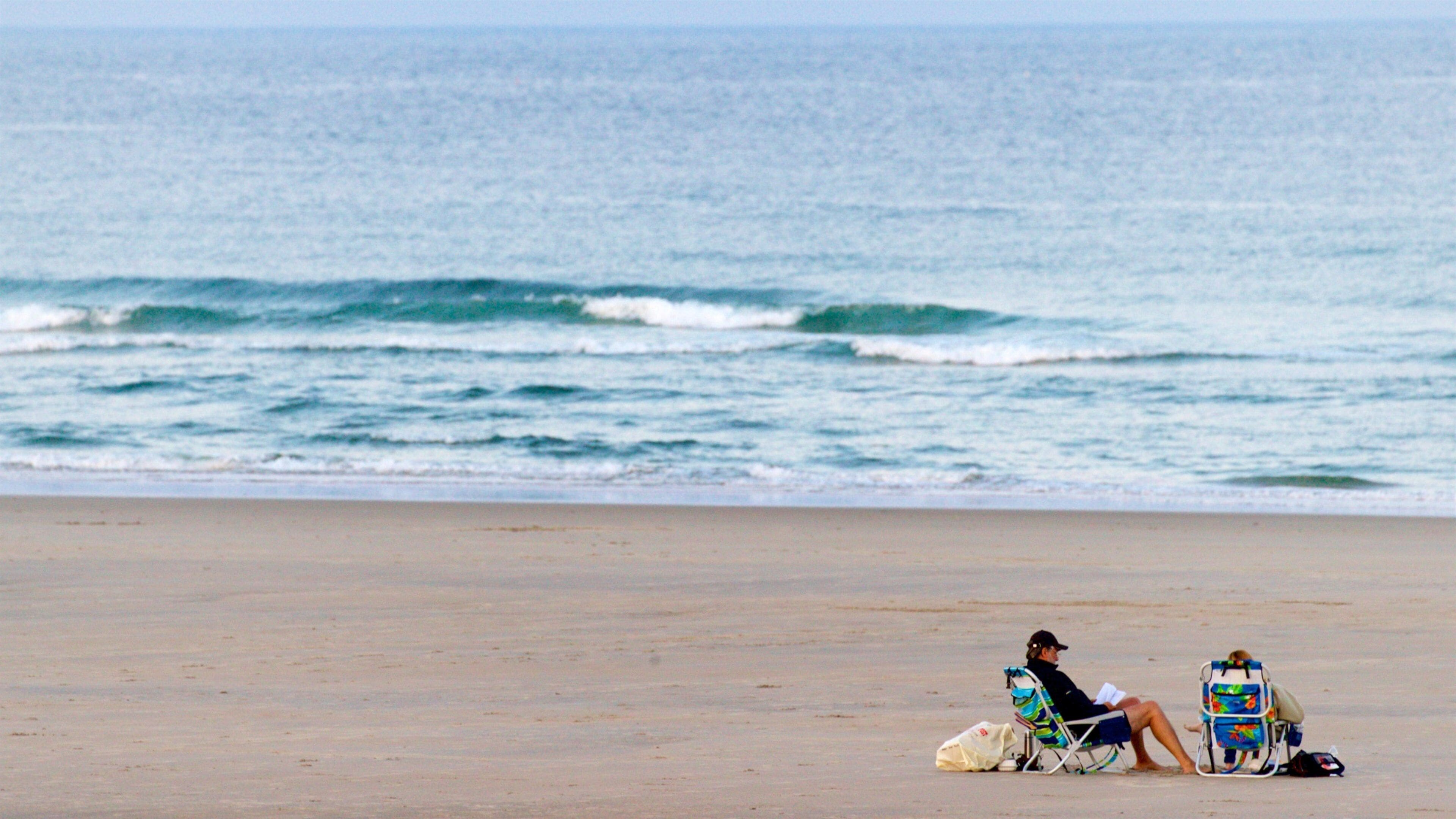 Ogunquit Beach showing general coastal views and a beach as well as a couple