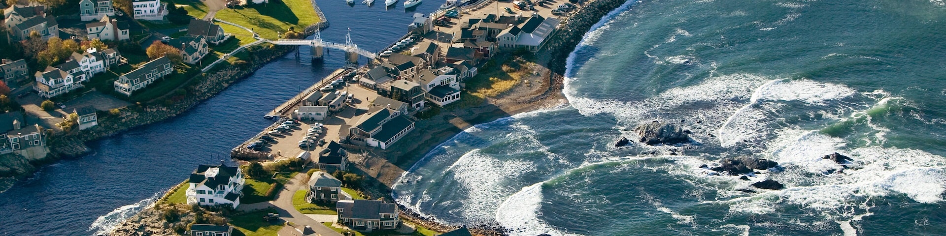 Aerial view of fishing boats anchored in Perkins Cove, on coast of Maine south of Portland