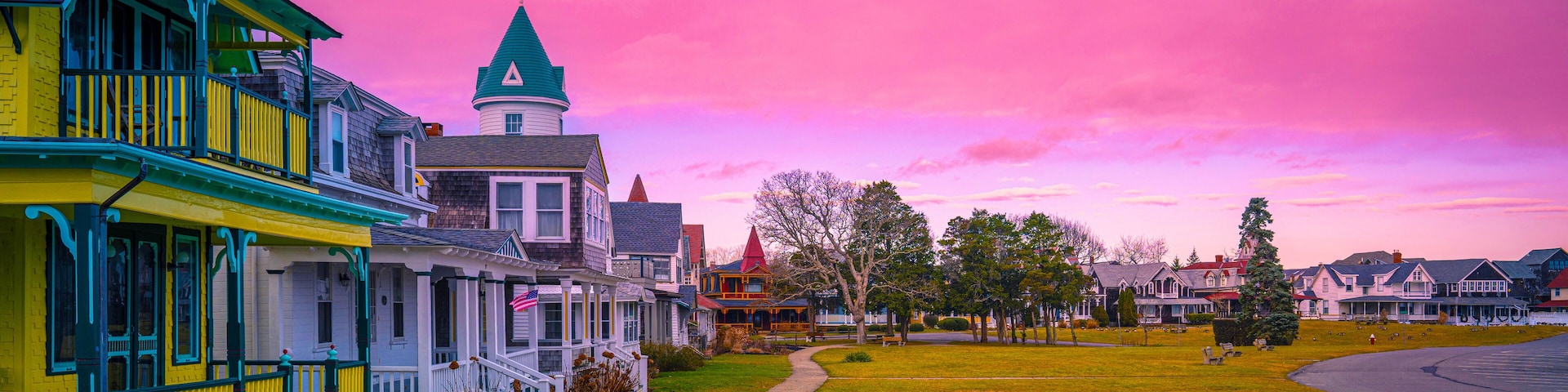 Oak Bluffs skyline, well-preserved landmark houses, and dramatic winter sunset cloudscape over the Ocean Park on the island of Martha's Vineyard in Dukes County, Massachusetts, United States