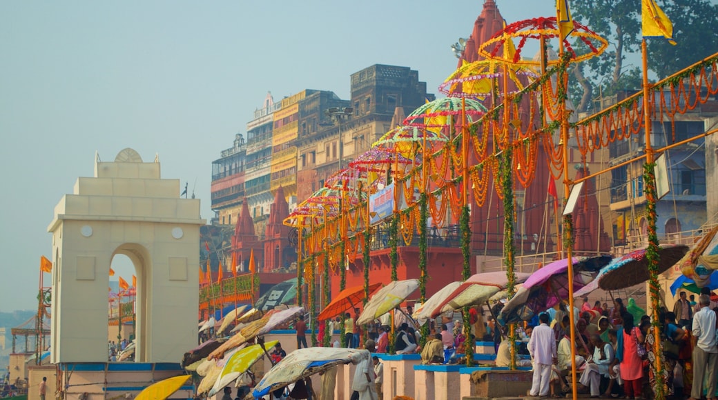 Dasaswamedh ghat featuring markets as well as a large group of people