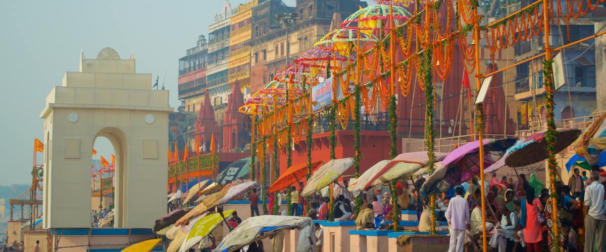 Dasaswamedh ghat featuring markets as well as a large group of people
