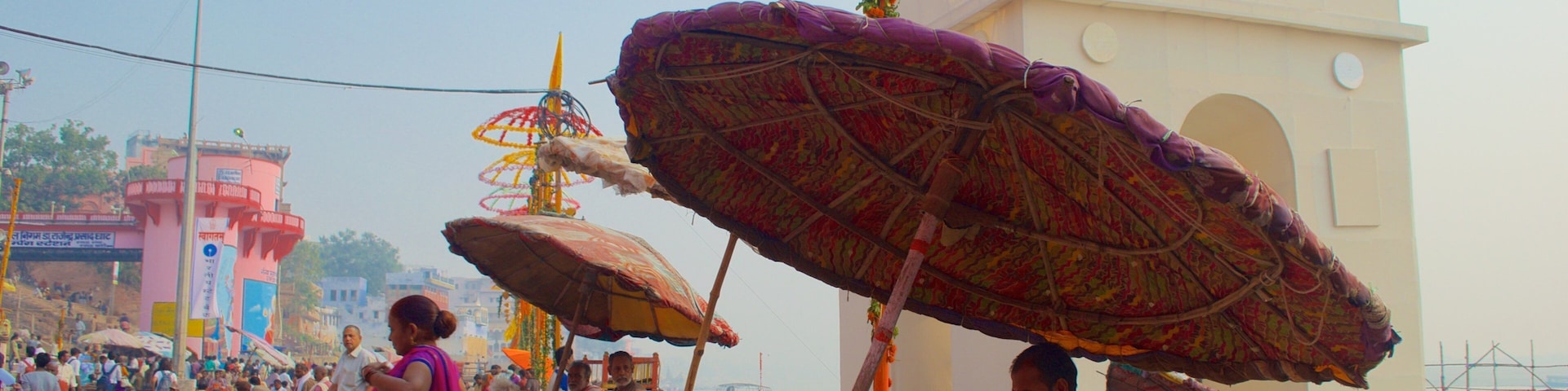 Dasaswamedh ghat which includes markets as well as a small group of people