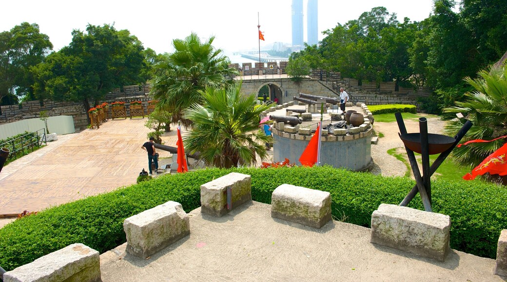 Hulishan Cannon Fort showing outdoor art, a castle and military items