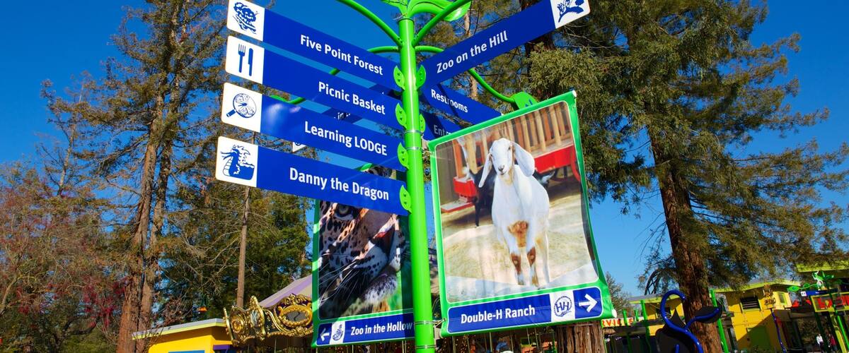 Happy Hollow Park and Zoo which includes signage and zoo animals