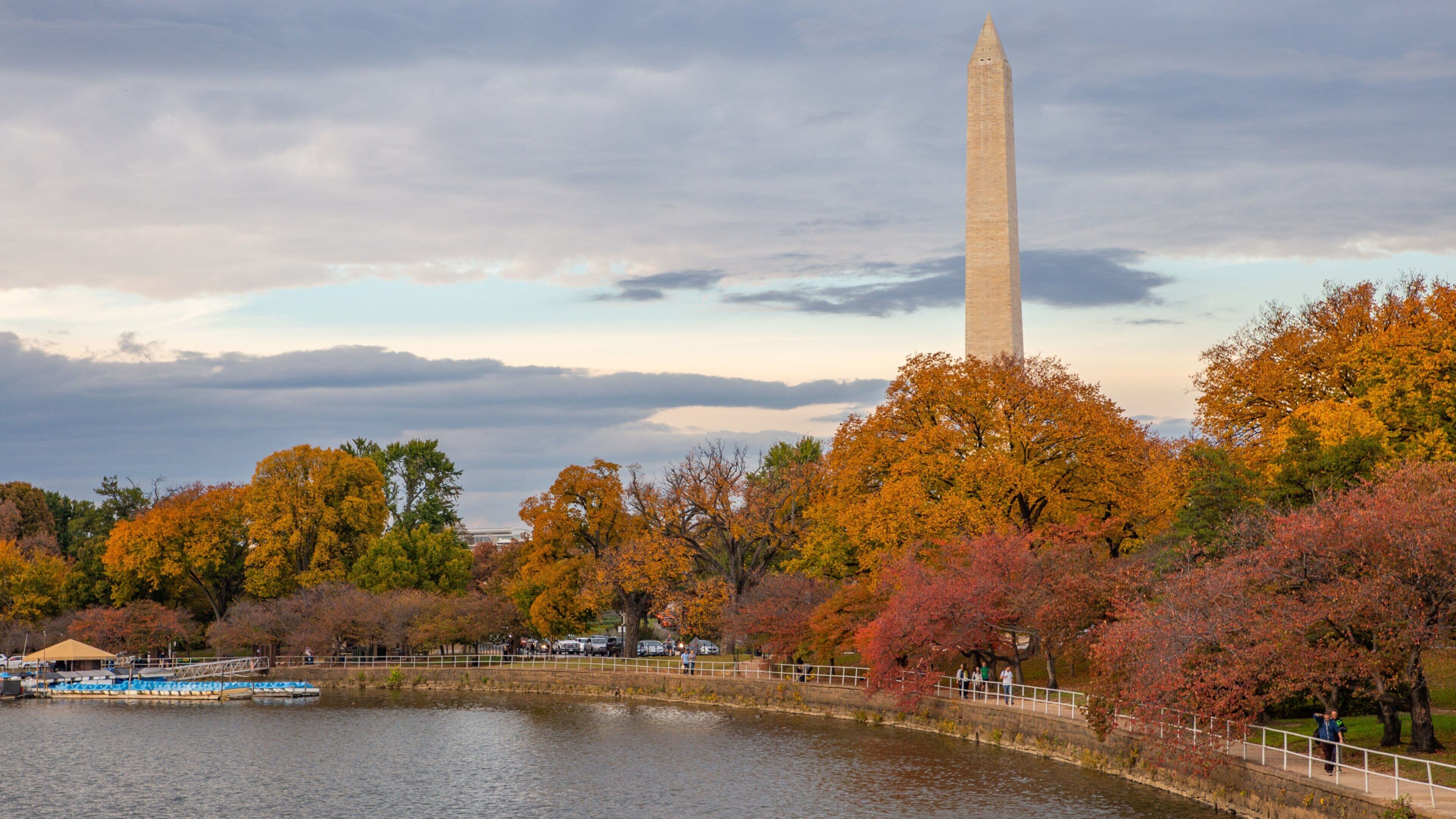 Tidal Basin showing a sunset, a monument and a lake or waterhole