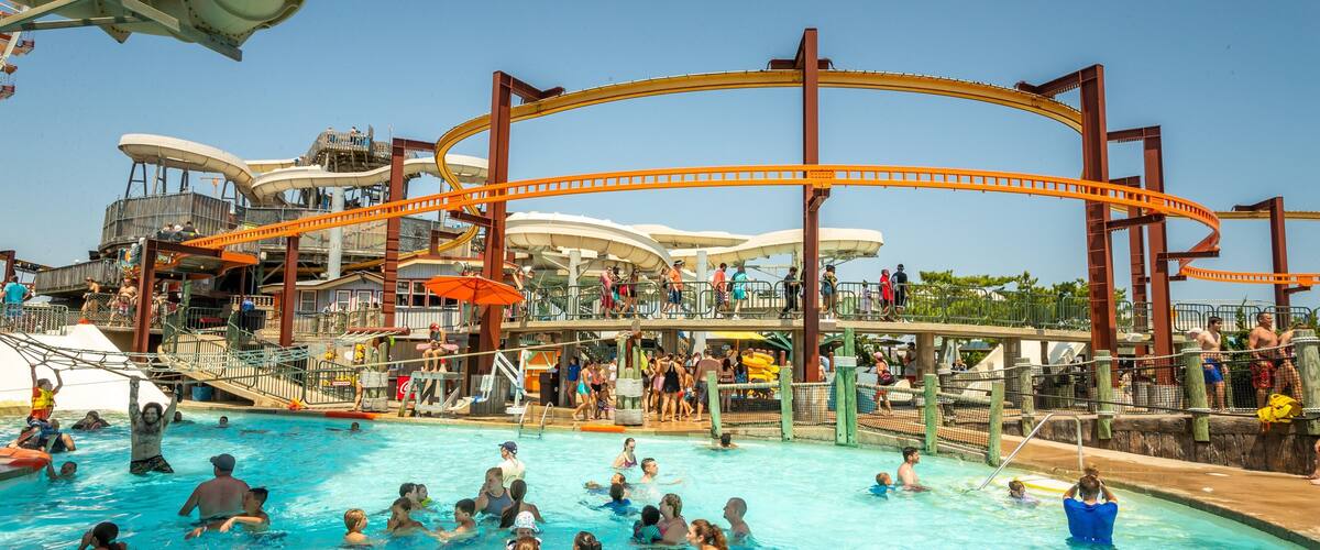 Raging Waters showing a waterpark and swimming as well as a large group of people
