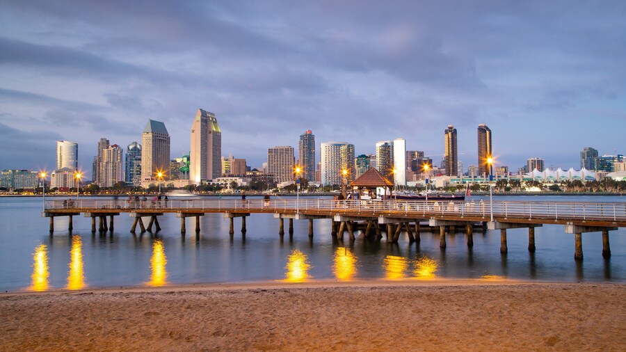 Coronado Ferry Landing featuring a sunset, a city and a beach