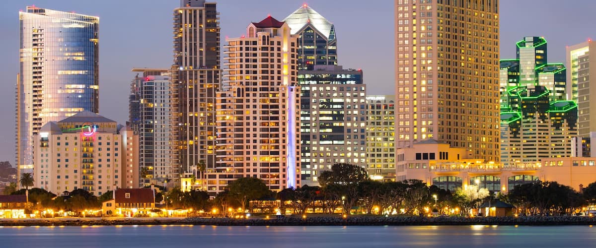Coronado Ferry Landing featuring night scenes, a city and a bay or harbor