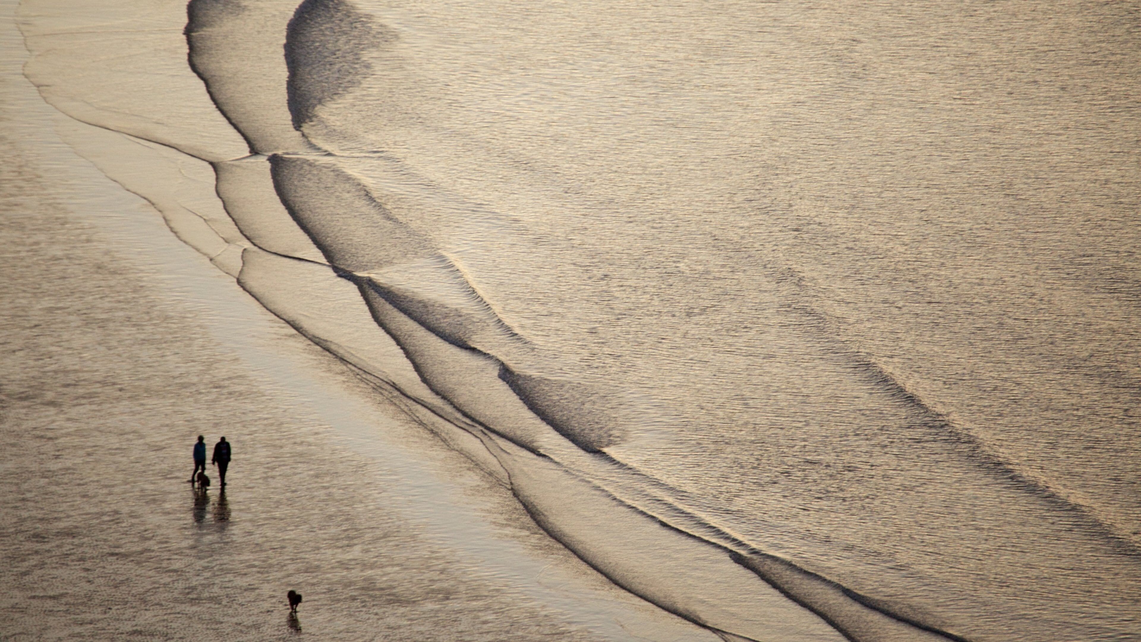 North Bay Beach showing a sandy beach and general coastal views as well as a couple