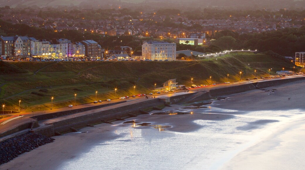 North Bay Beach featuring landscape views, night scenes and a sandy beach