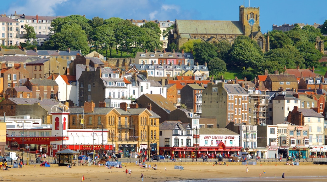 South Bay Beach showing a coastal town and a sandy beach