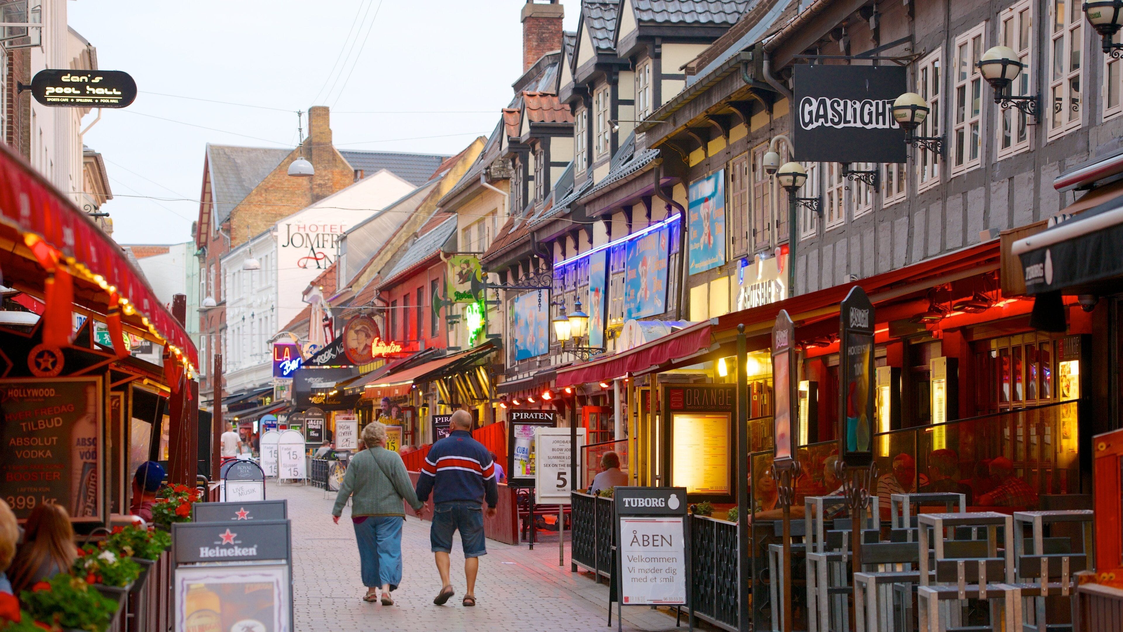 Jomfru Ane Gade which includes outdoor eating and a city