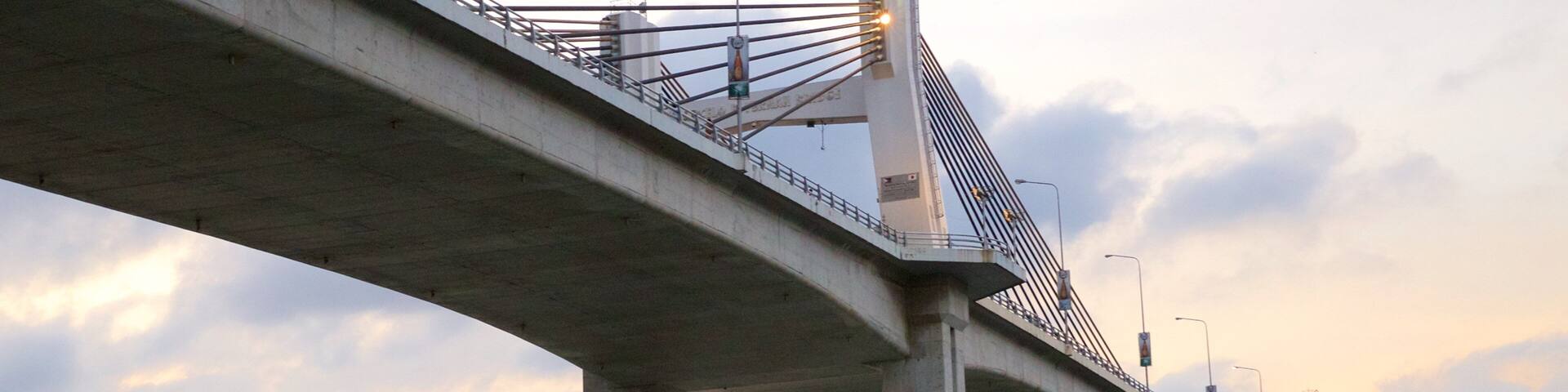 Marcelo Fernan Bridge featuring a sunset and a bridge