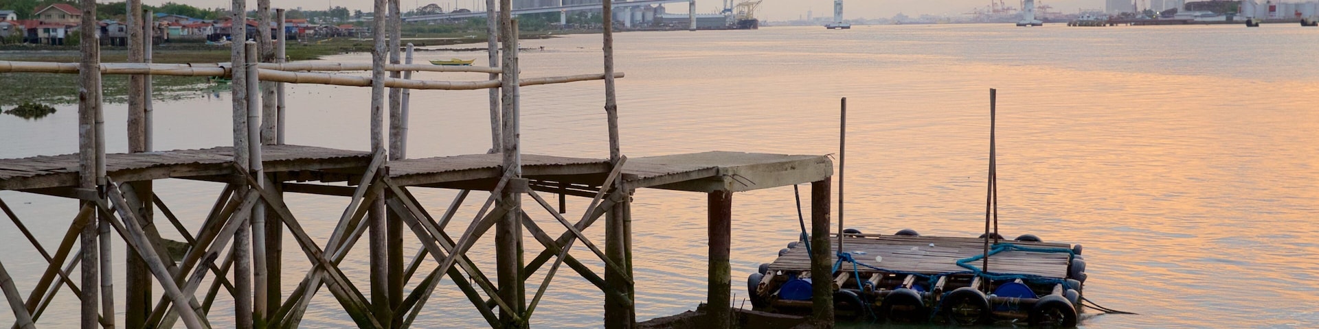 Marcelo Fernan Bridge showing a sunset and a river or creek