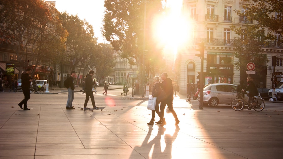 Place de la Republique featuring street scenes, a city and a sunset