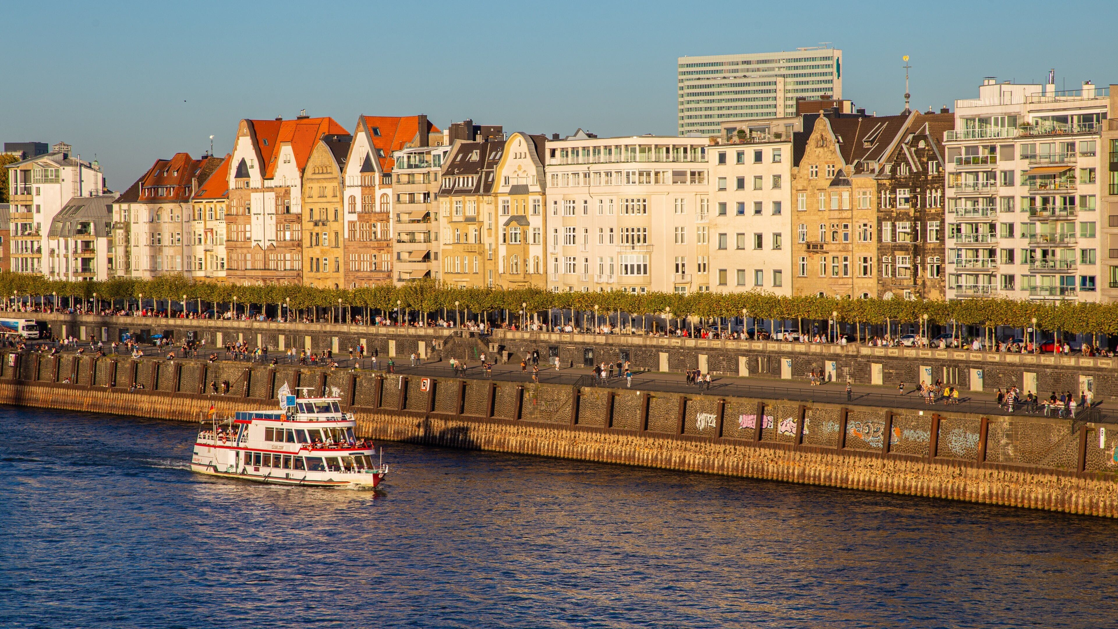 Düsseldorf Old Town featuring boating, a city and a river or creek