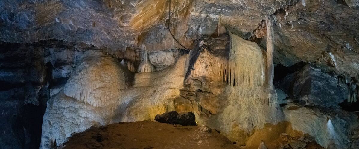 A cave with stalactites and stalagmites.
