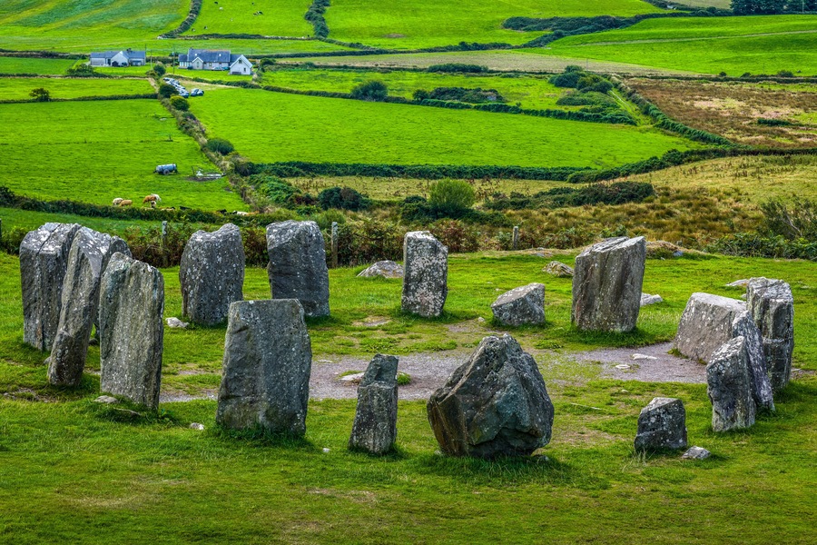 Closeup of Drombeg Stone Circle on a green meadow in summer, County Cork, Ireland