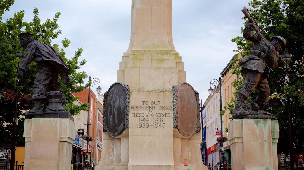 Diamond which includes signage, a monument and a statue or sculpture