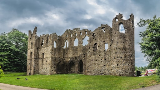 Historic Stone Ruins Jelous wall in Lush Green Landscape Under Cloudy Sky, Belvedere Castle, Ireland