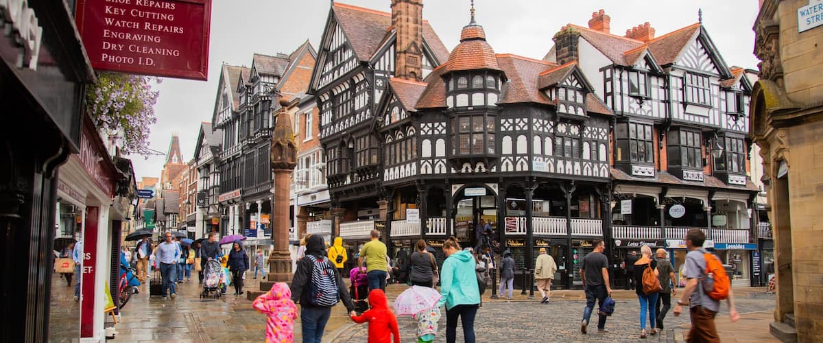 Chester which includes street scenes and heritage elements as well as a large group of people