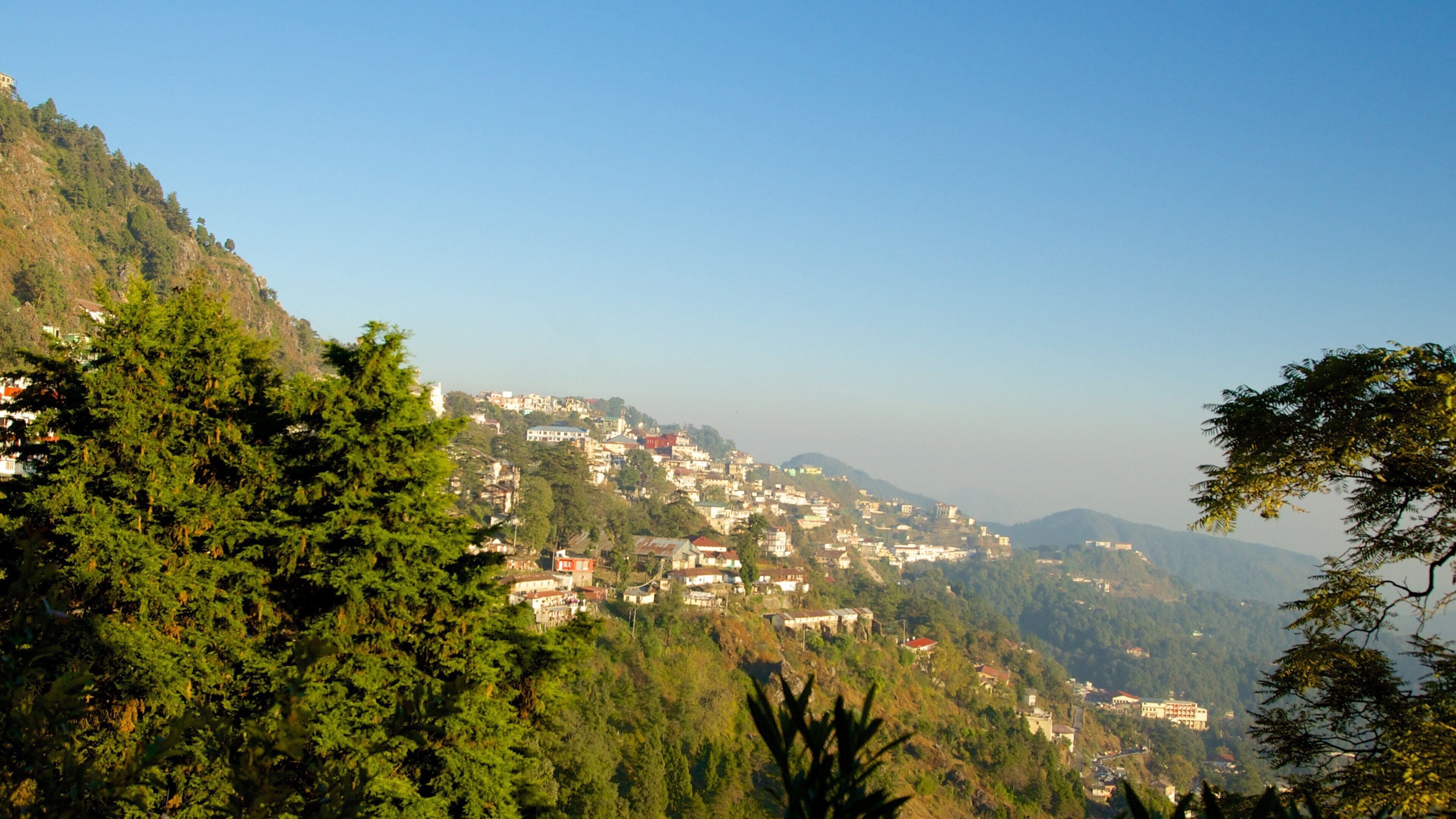Gun Hill showing tranquil scenes and a small town or village