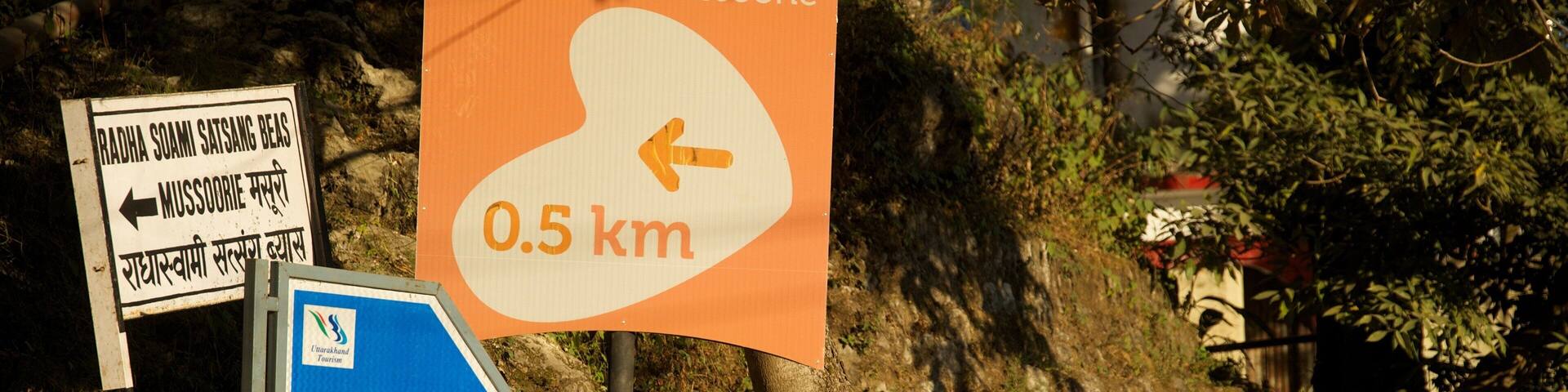 Gun Hill featuring signage