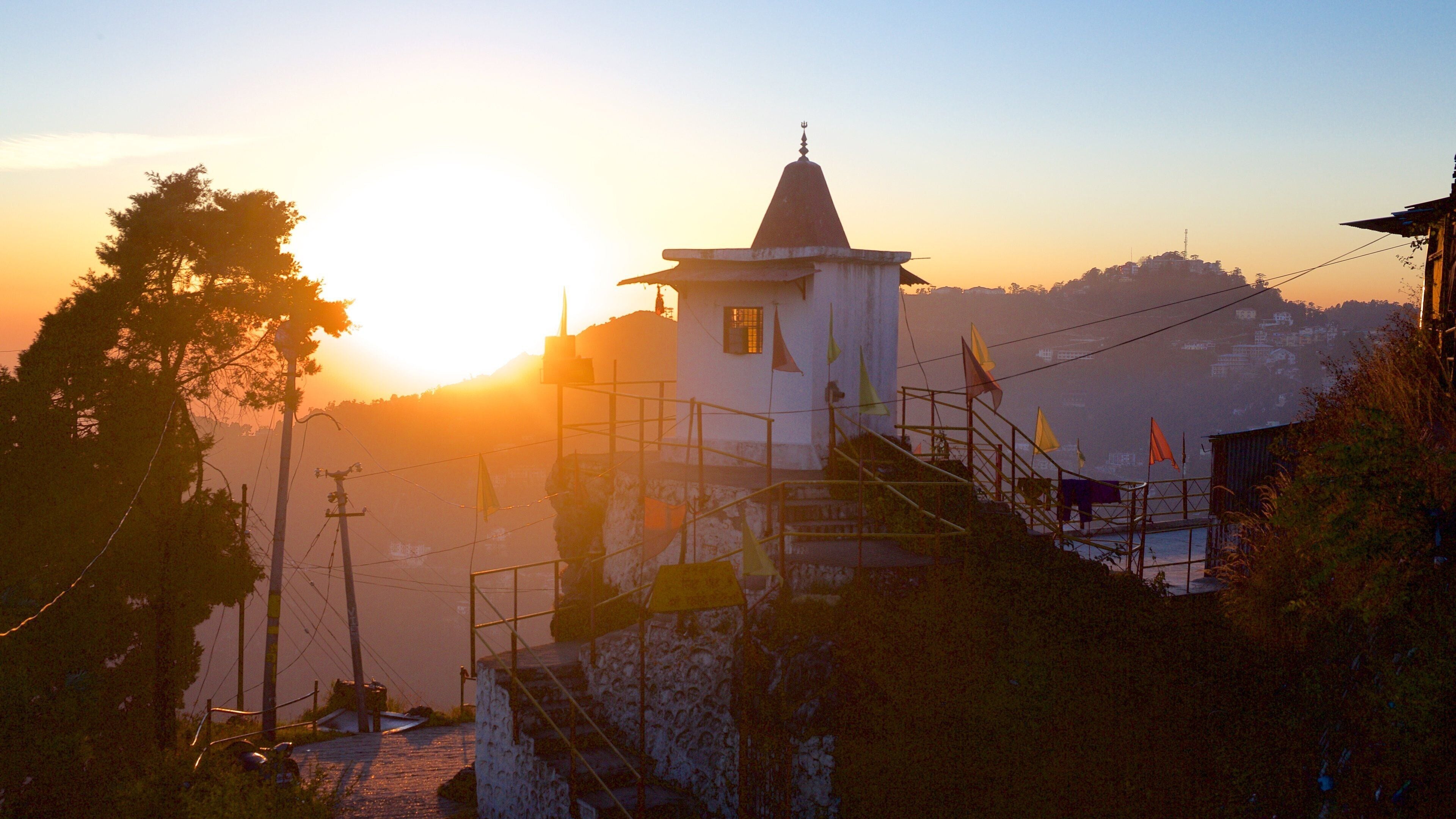 Gun Hill which includes a sunset