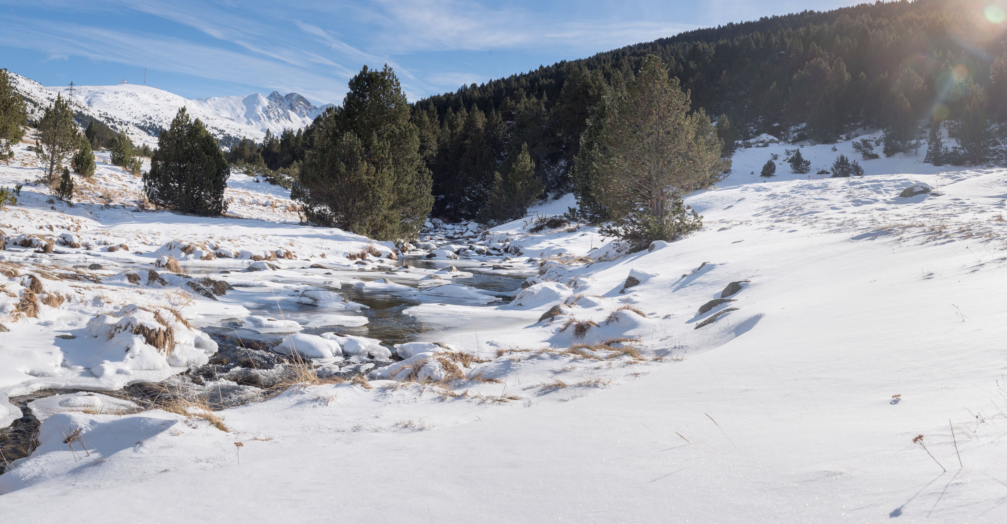 Beautiful path in the first autumn snow in Bordes de Envalira, Canillo, Andorra.