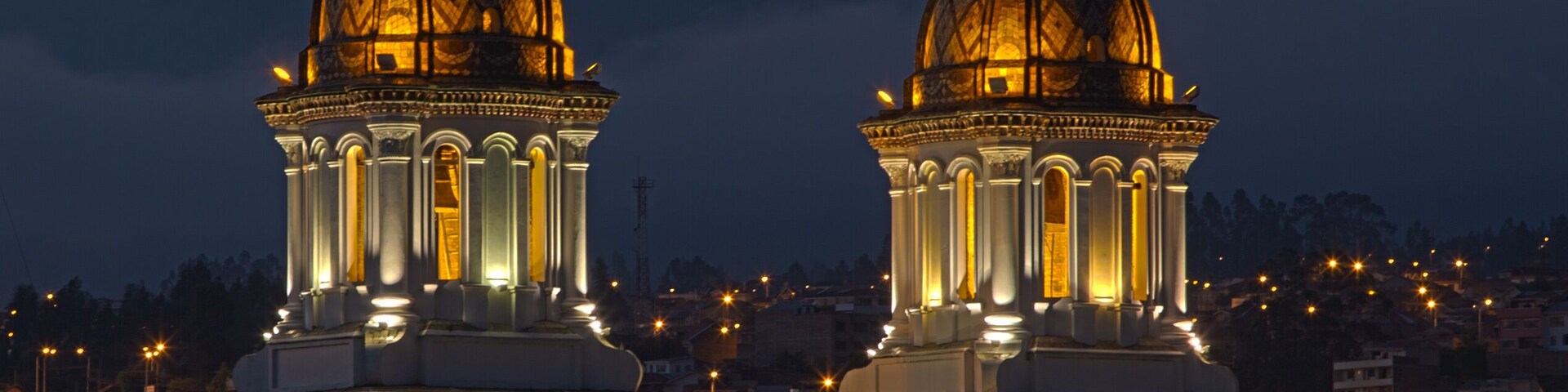Santo Domingo church at night, as seen from a rooftop on Park Calderon