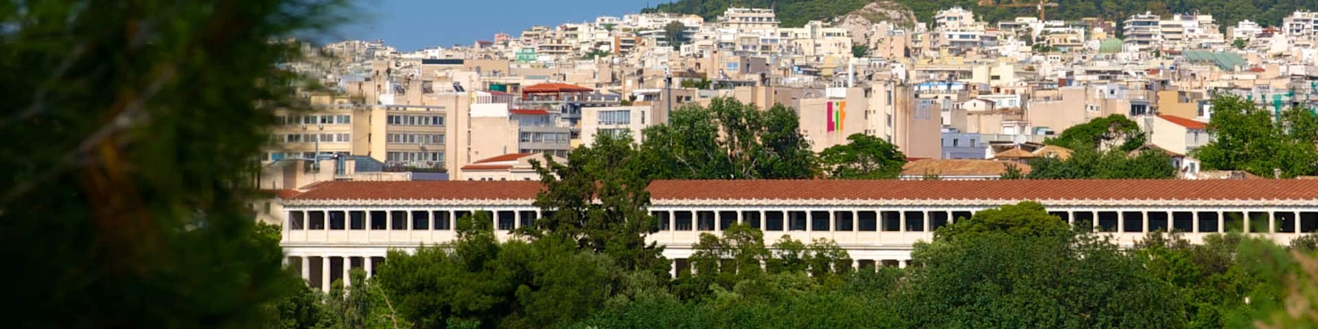 Berget Lycabettus som visar en stad och berg