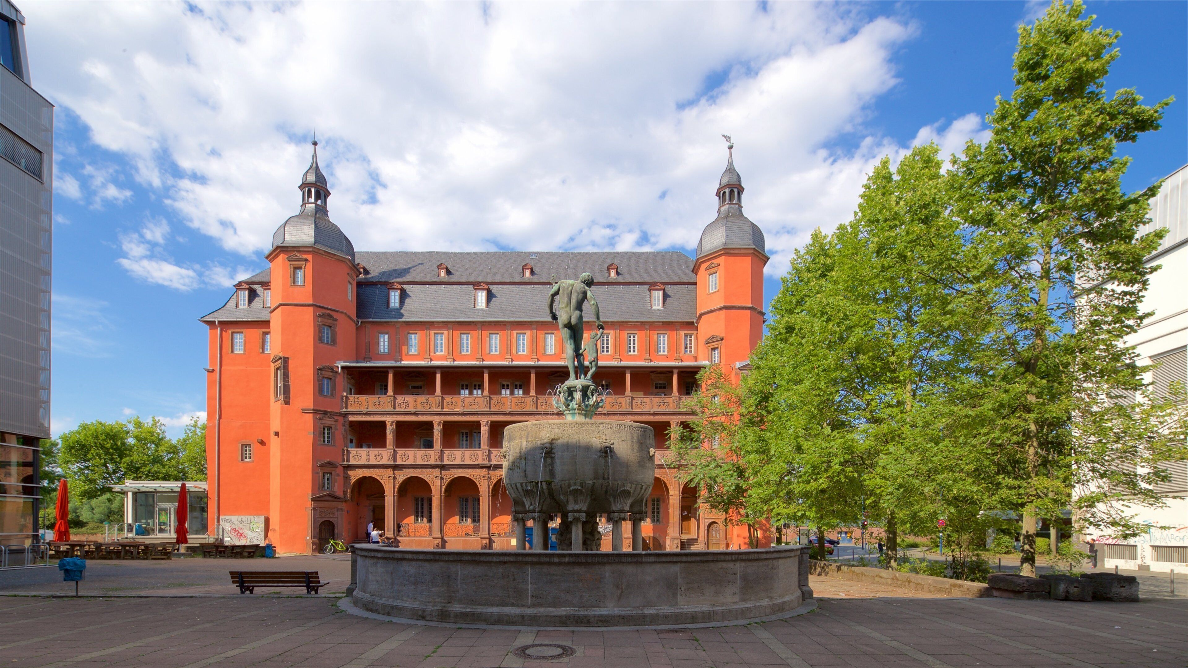 Buesing Palais featuring heritage architecture, a fountain and a statue or sculpture