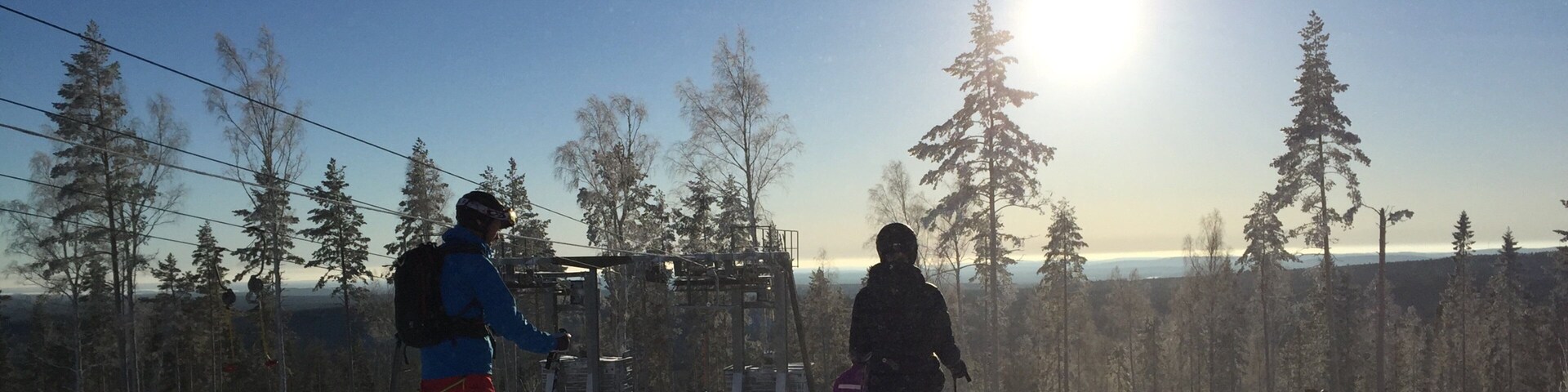 Kungsberget Ski Resort featuring snow skiing and snow as well as a small group of people