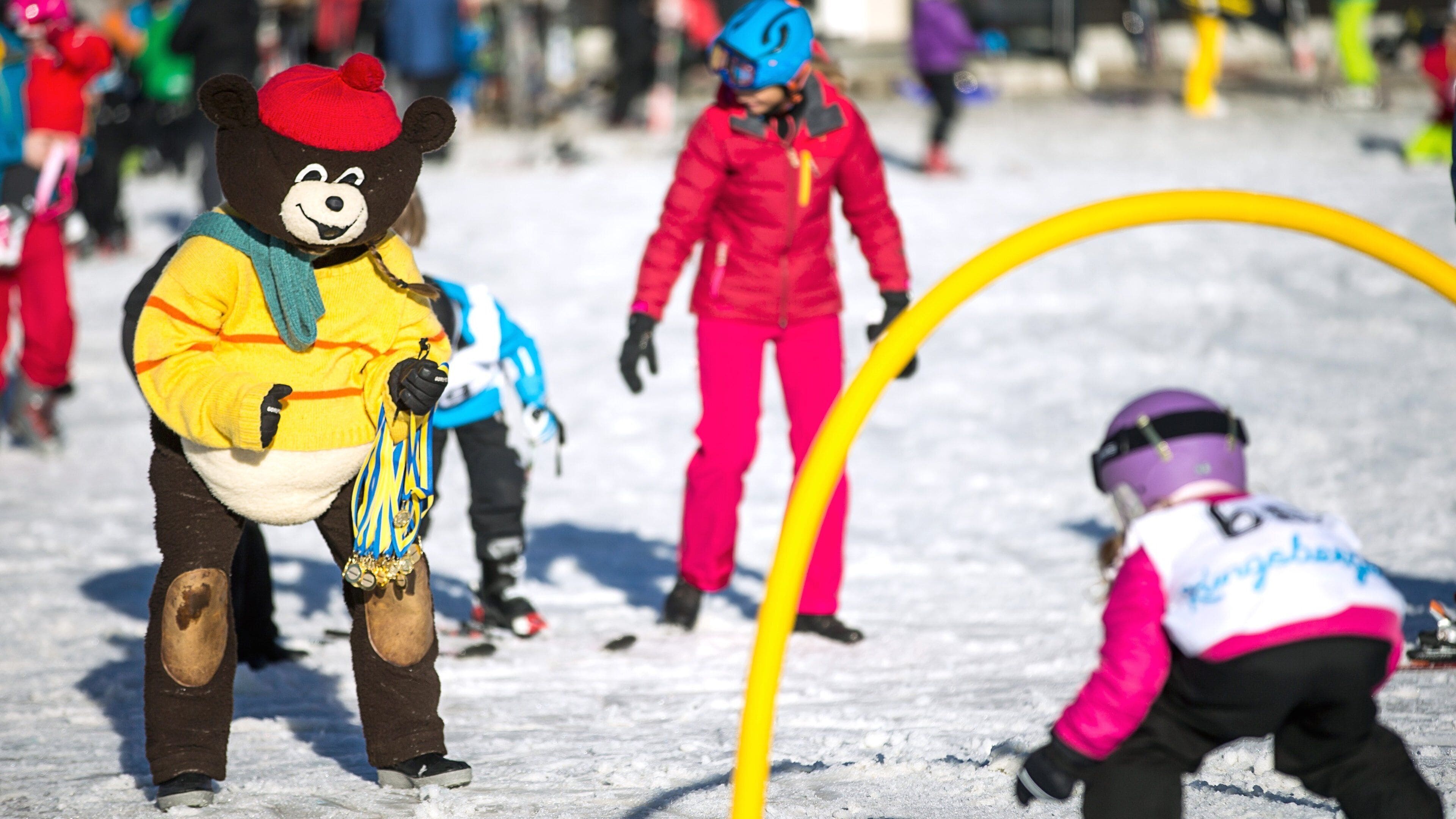 Kungsberget Ski Resort featuring snow as well as a large group of people