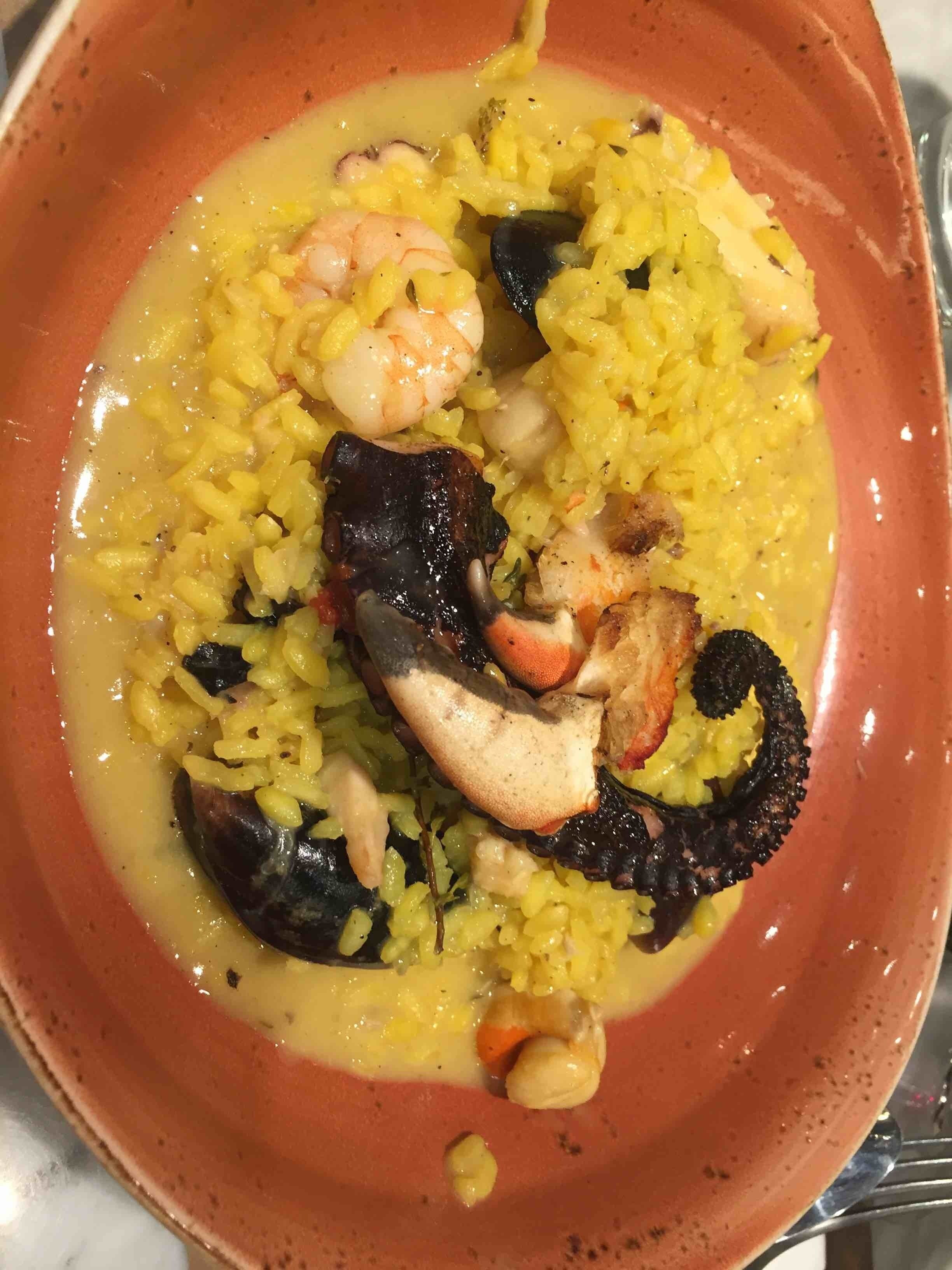 Risotto con azafrán , pulpo y jaiva
