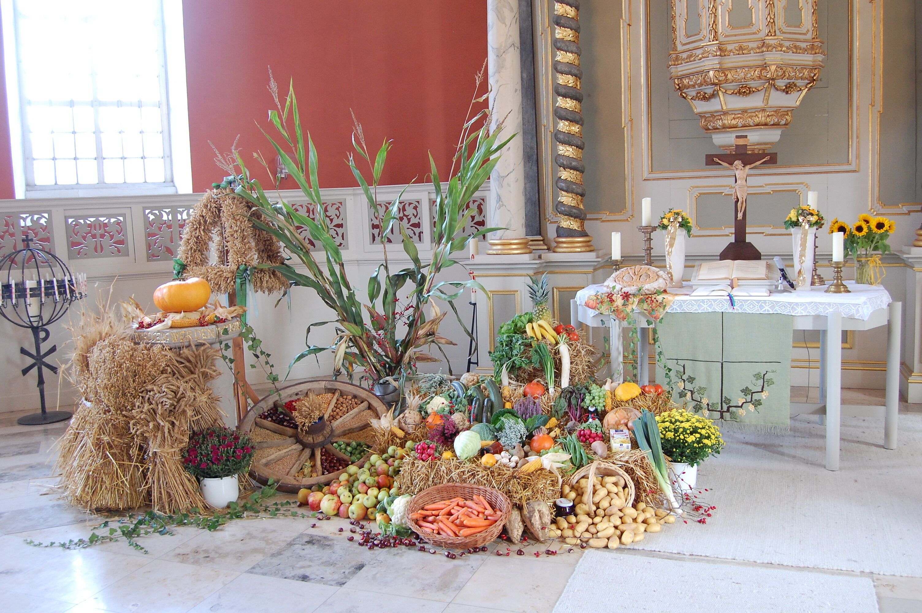 Thanksgiving decorations in front of the altar of St. Pancratius church in Barterode, Germany on October 5, 2014