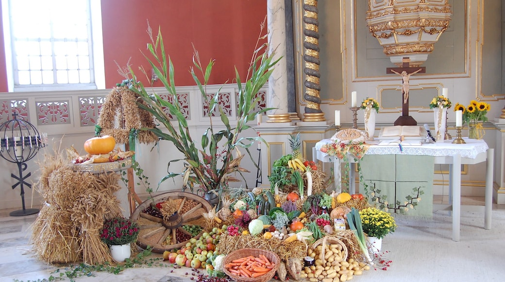 Thanksgiving decorations in front of the altar of St. Pancratius church in Barterode, Germany on October 5, 2014
