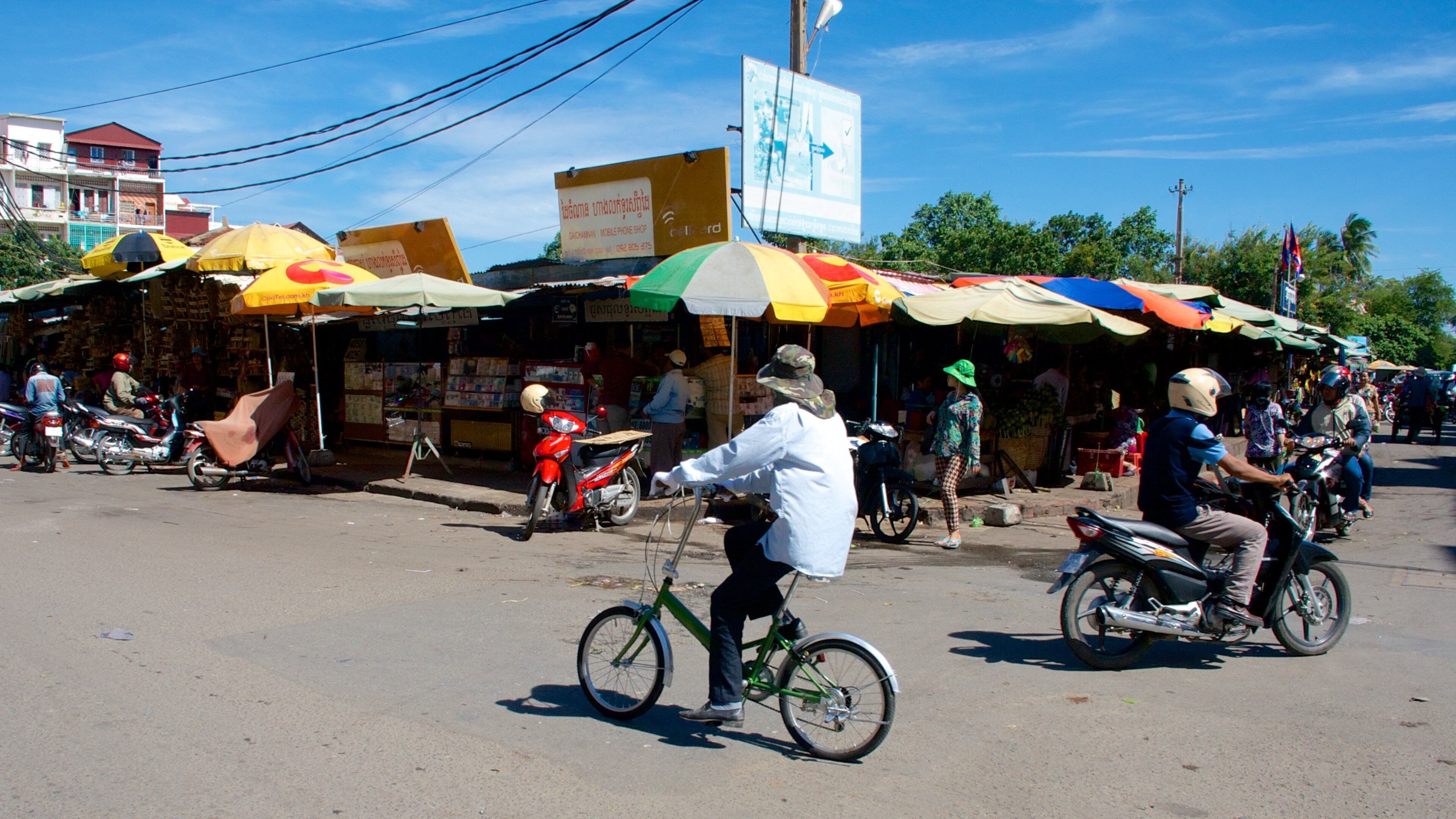 Old Market featuring motorbike riding, cycling and street scenes