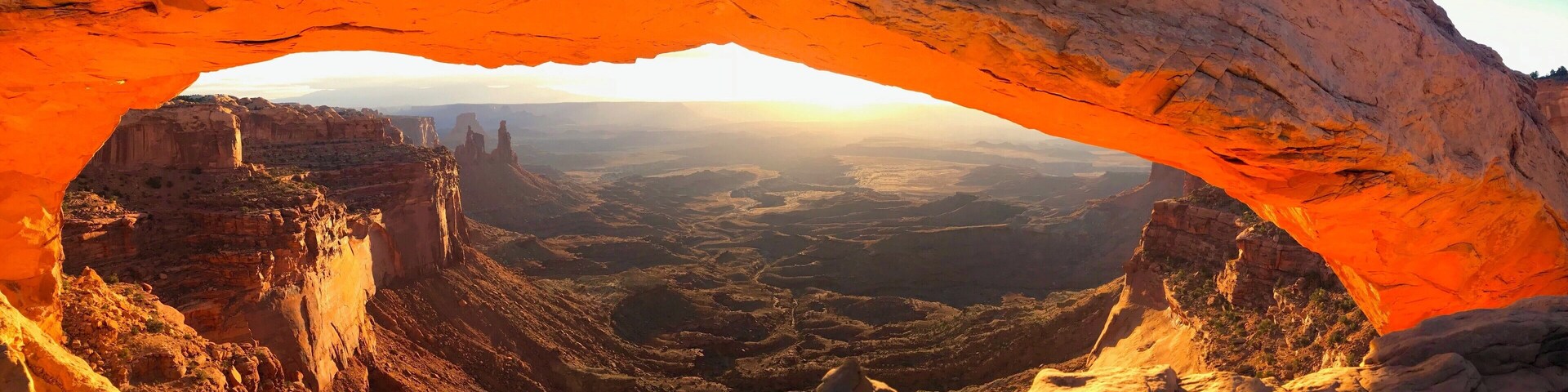 I've seen a lot of photos of Mesa Arch. What you don't see are the days when a bus load of 40 photographers unload from a huge tour bus and take up all the spots for a good picture, all lined up with a wall of tripods. Then some days you get very lucky!