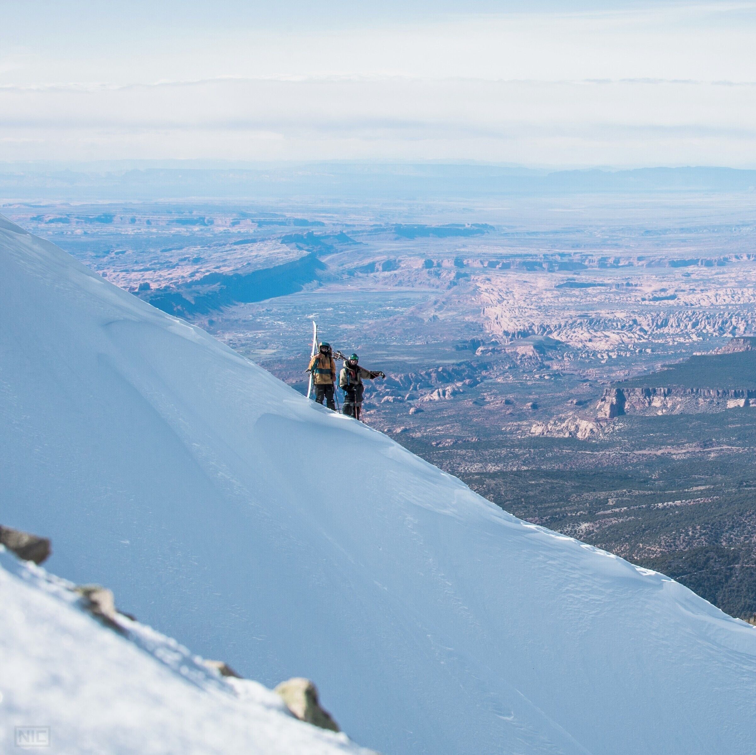 At 12,000 feet this ridge is overlooks Moab and the vally below where the Colorado river has carved its way through the soft sandstone.  We brought our skis to summit Little Tukuhnikivatz and ski the 4000 vertical feet down to the yurt we stayed at below.  This was in March when the mountains are cold and the desert is warm, perfect for multi-sport days.

https://talkingmountainyurts.com/gold-basin-yurt/