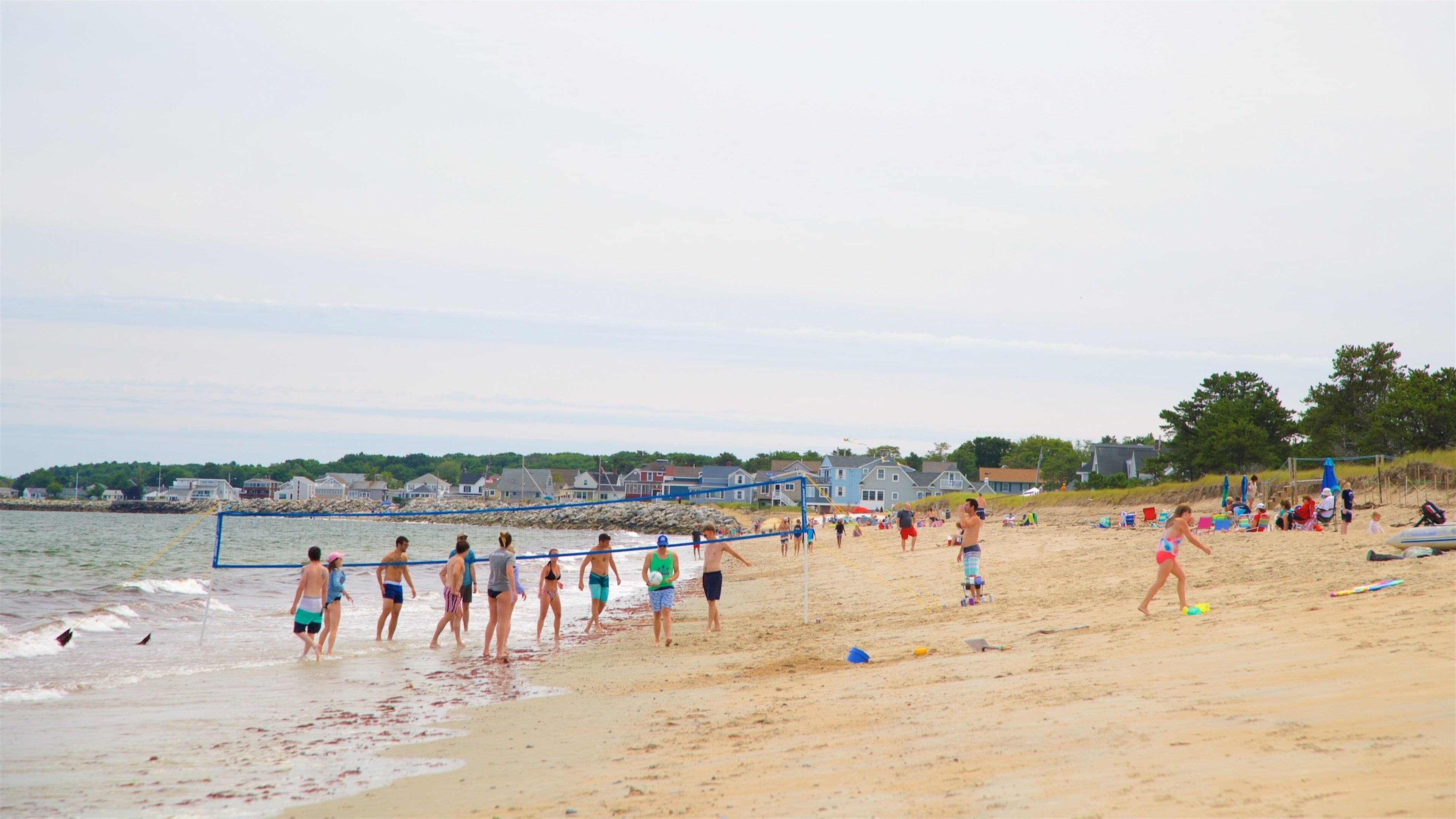 Ferry Beach State Park which includes a beach, general coastal views and a coastal town