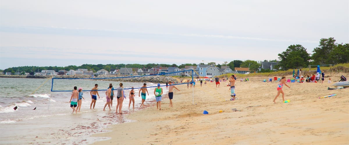 Ferry Beach State Park which includes a beach, general coastal views and a coastal town
